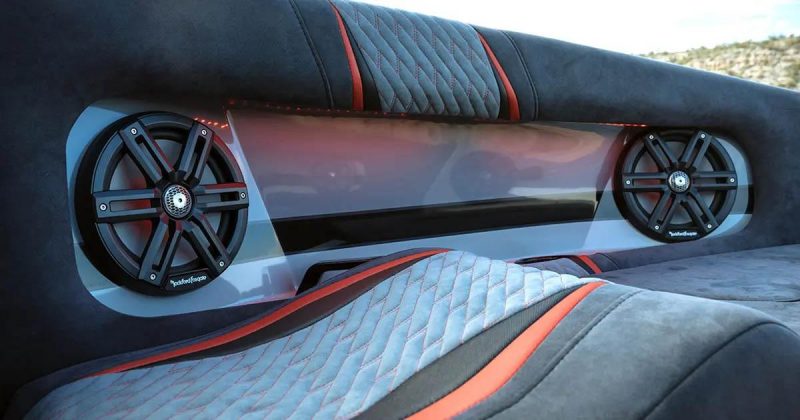 Rockford Fosgate speakers integrated into a boat seating area with red accents
