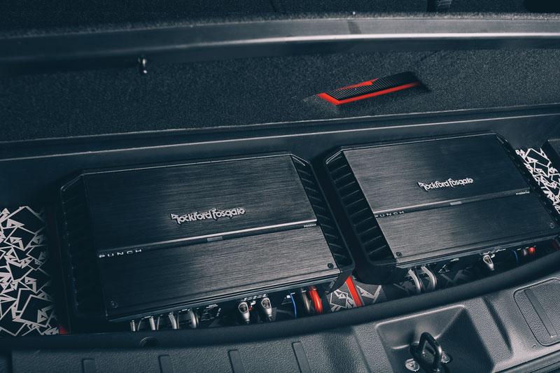 Two Rockford Fosgate Punch amplifiers installed in a car trunk for enhanced audio